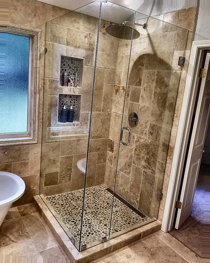 Neutral stonework, inset niche and clear glass.